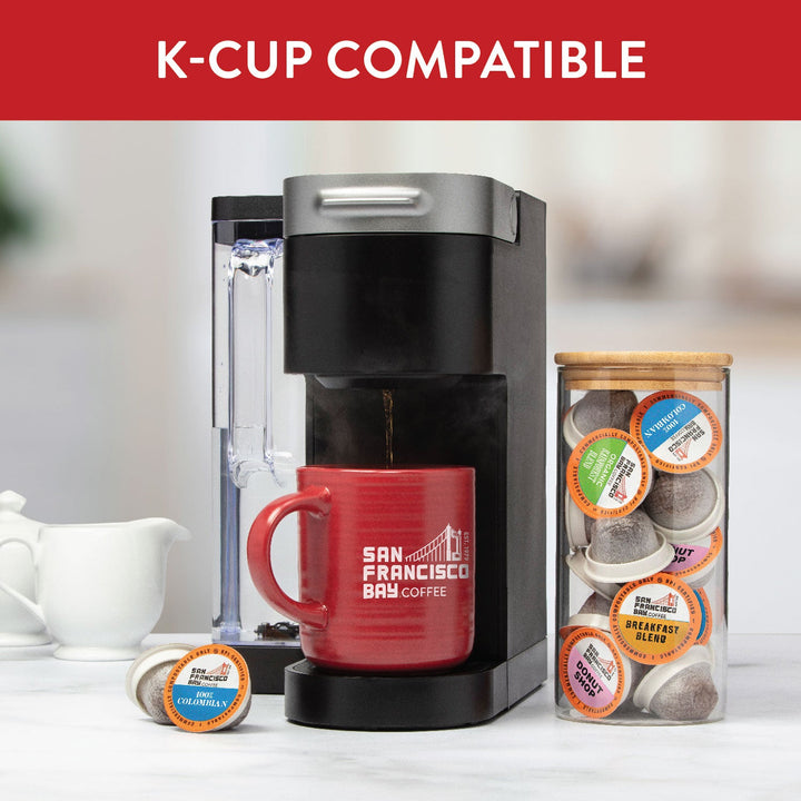 K-Cup compatible. Image of K-Cup brewer with SF Bay Coffee products.