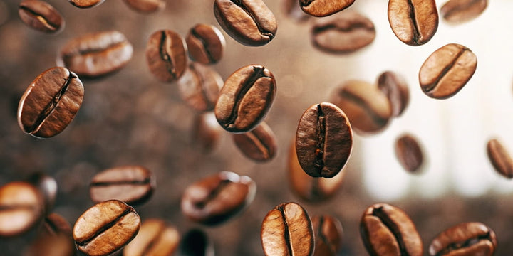 coffee beans falling